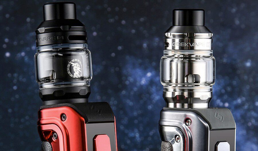 Two Geekvape Z 2021 tanks are shown attached to mods on a blurry celestial background.